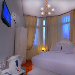 Hotel Tahrir Plaza Suites cazare Clinton