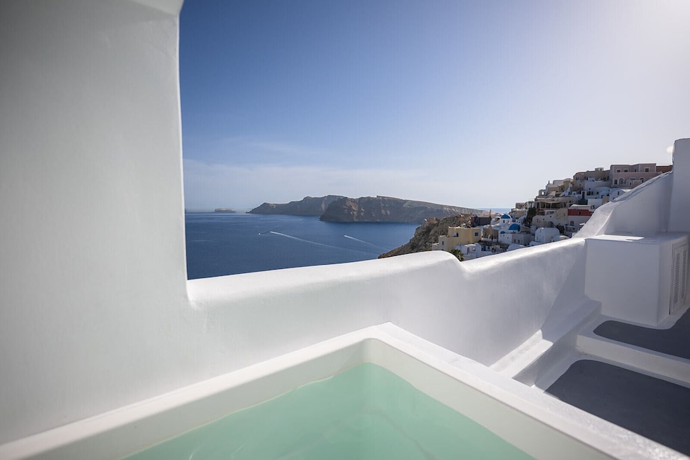 Three Domes Oia An Iconic Collection