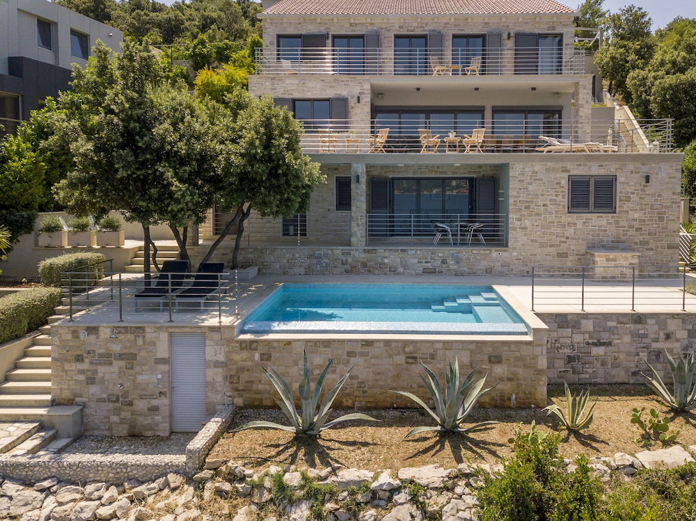 Hotel Beachfront Villa Poseidon With Heated Pool