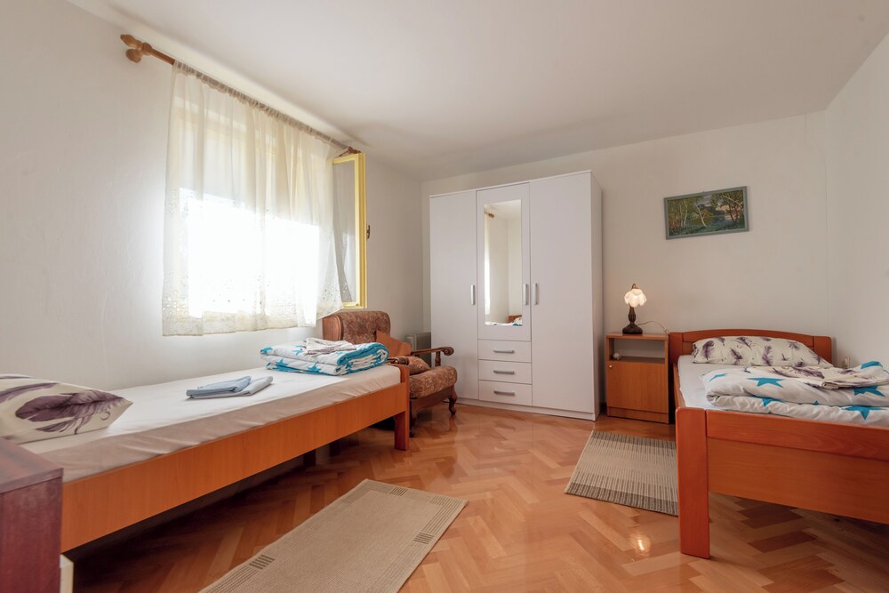 Hotel The Apartment Consists Of Two Bedrooms, A Bathroom, A Kitchen And A Living Room