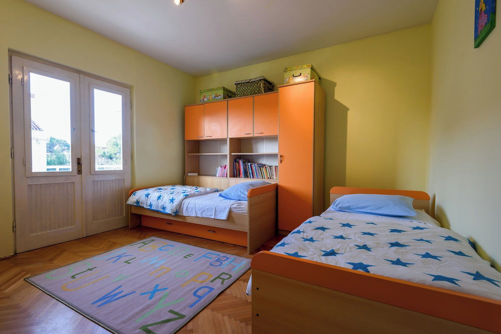 Hotel The Apartments Consists Of Two Bedrooms, A Bathroom, A Kitchen And A Living Room