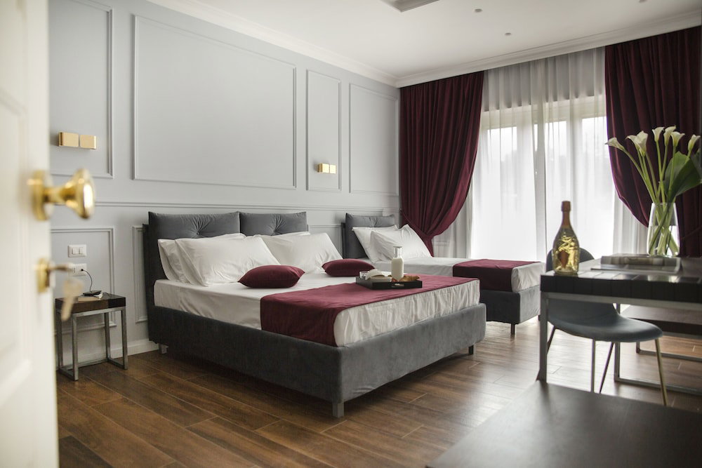 Hotel Unicum Roma Suites