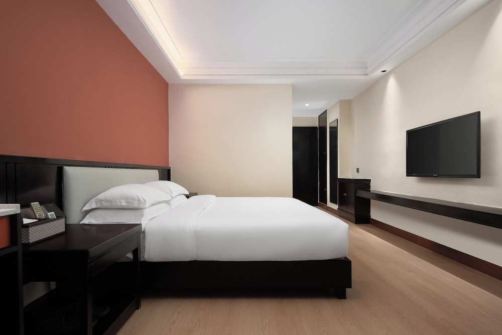 Hotel Huaqijiudian