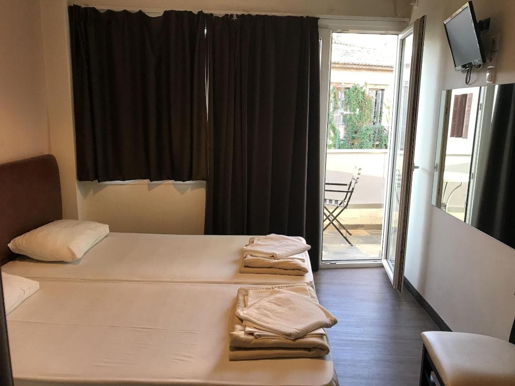 Hotel Pella Inn Hostel