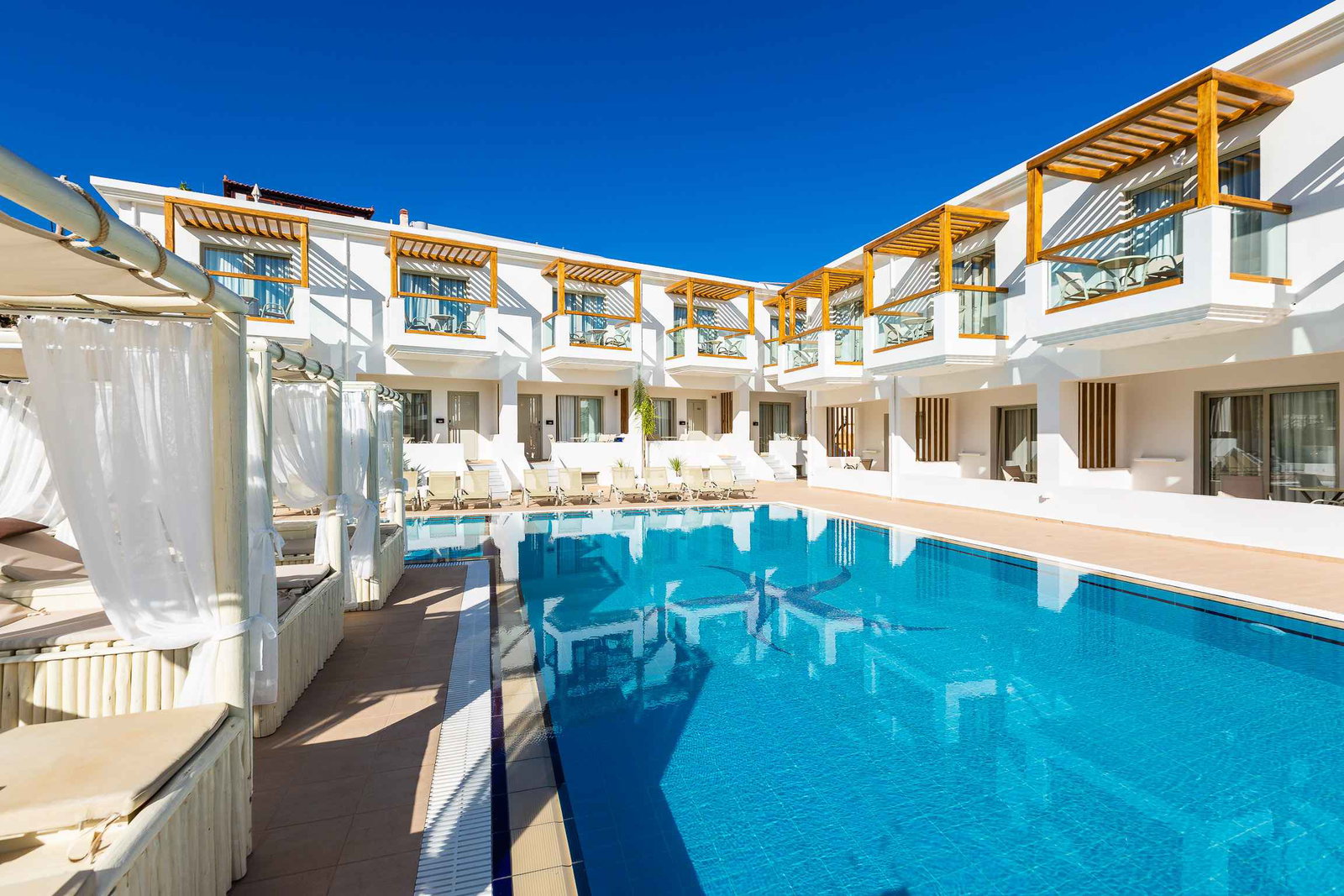 dal travel Nostos Beach Boutique Hotel