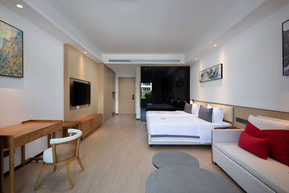 Hotel Ramada Encore By Wyndham Jiusuo Downtown